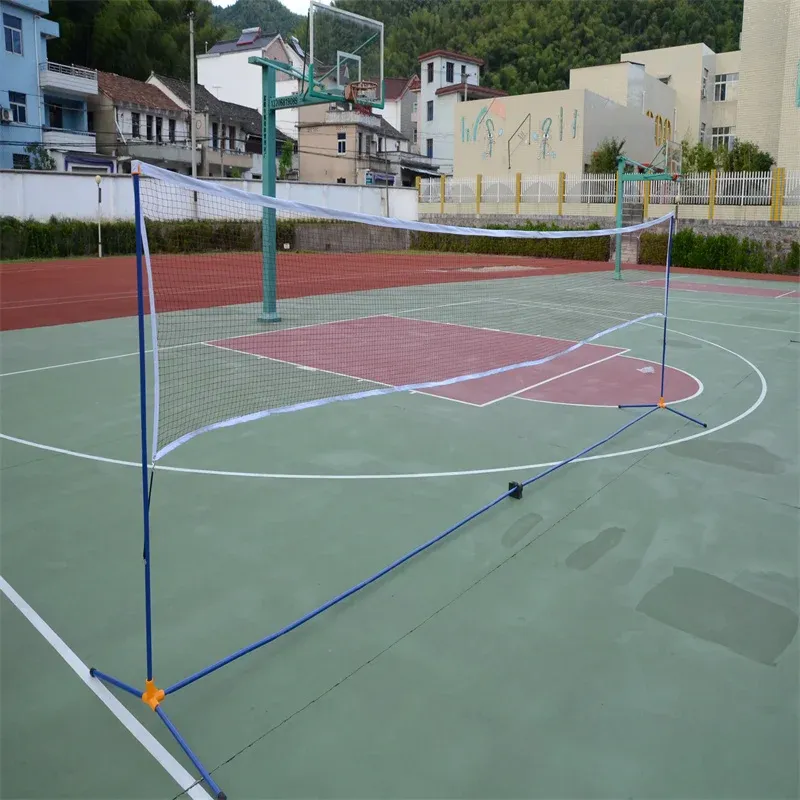 Court barrier net installed across an outdoor multi-sport court